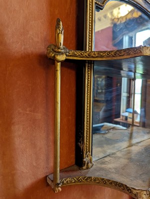 Lot 49 - A pair of parcel gilt wall shelves