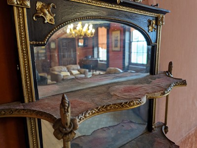 Lot 49 - A pair of parcel gilt wall shelves