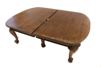 Lot 37 - A George II style mahogany extending dining table