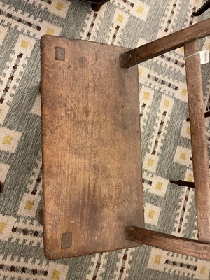 Lot 28 - A primitive elm joined bench
