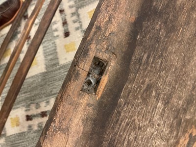 Lot 28 - A primitive elm joined bench