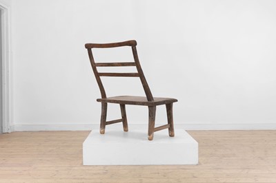 Lot 28 - A primitive elm joined bench