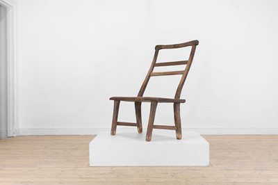 Lot 28 - A primitive elm joined bench