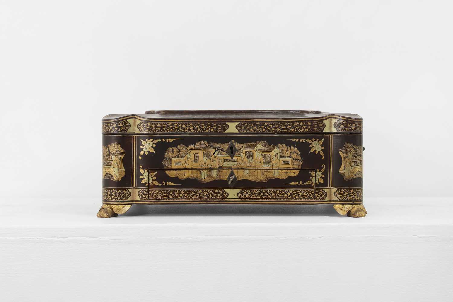 Lot 419 - A black lacquered and parcel-gilt workbox