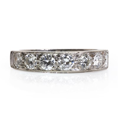 Lot 234 - An 18ct white gold half eternity ring