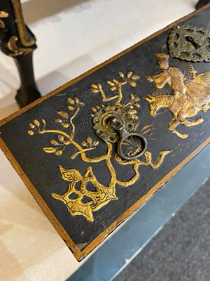 Lot 13 - A black lacquer and gilt-japanned chest on stand