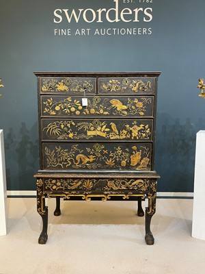 Lot 13 - A black lacquer and gilt-japanned chest on stand