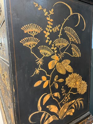 Lot 13 - A black lacquer and gilt-japanned chest on stand