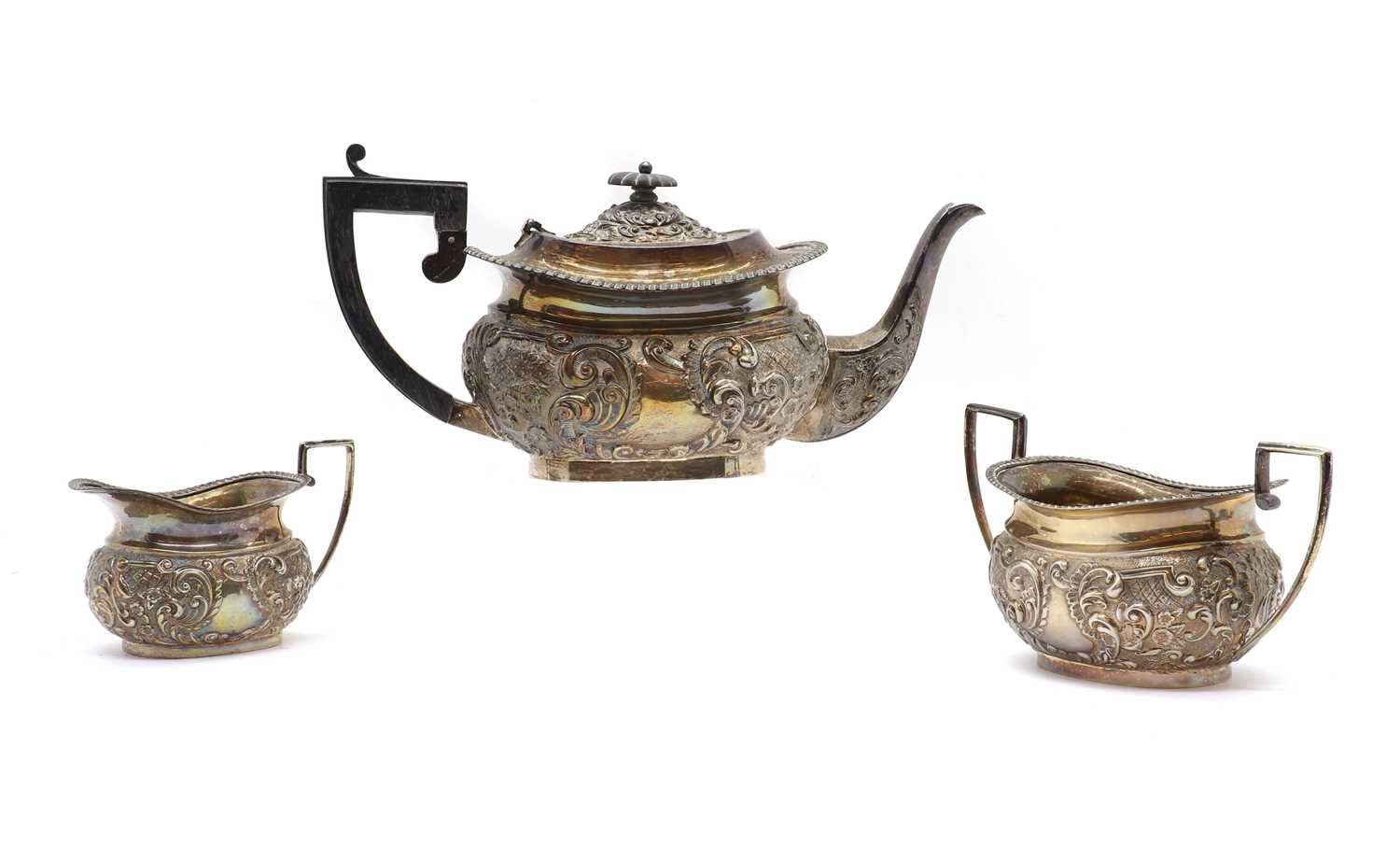 Lot 12 - A three piece silver tea service