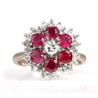 Lot 91 - A white gold ruby and diamond cluster ring