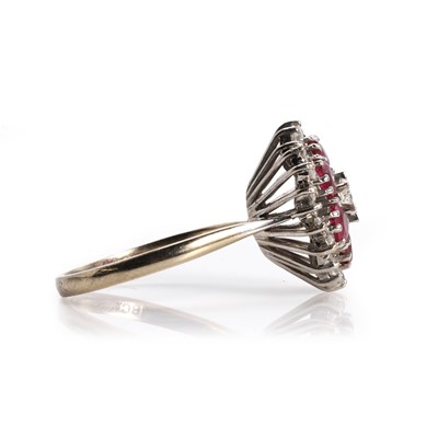 Lot 91 - A white gold ruby and diamond cluster ring