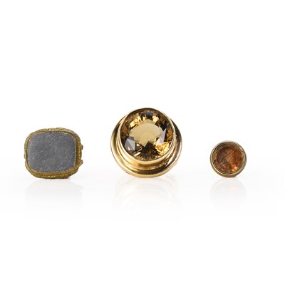 Lot 241 - A 9ct gold smoky quartz ring and two base metal fobs