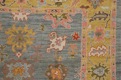 Lot 5 - An Oushak wool carpet