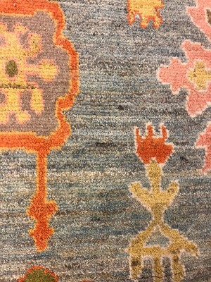 Lot 5 - An Oushak wool carpet