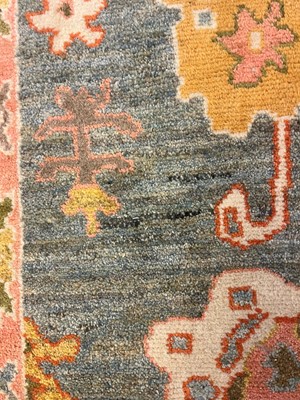 Lot 5 - An Oushak wool carpet