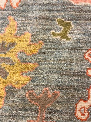 Lot 5 - An Oushak wool carpet