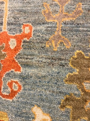 Lot 5 - An Oushak wool carpet