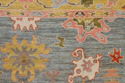 Lot 5 - An Oushak wool carpet