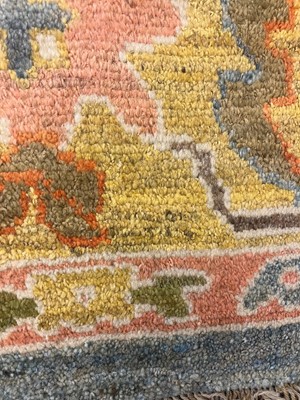 Lot 5 - An Oushak wool carpet