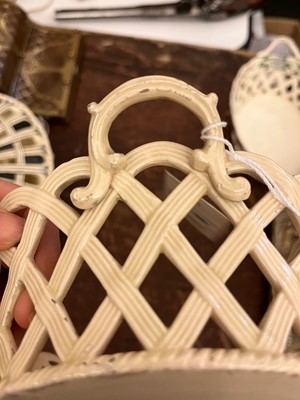 Lot 389 - A group of three creamware baskets