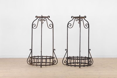 Lot 473 - A pair of wrought-iron jardinière frames