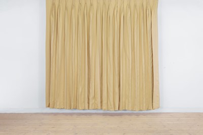 Lot 225 - A pair of pale gold striped silk curtains
