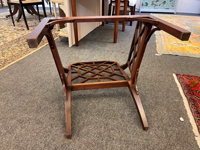 Lot 66 - A set of four George III-style mahogany 'cockpen' elbow chairs