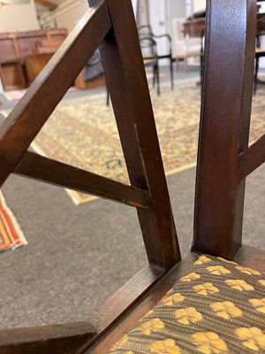 Lot 66 - A set of four George III-style mahogany 'cockpen' elbow chairs