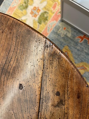 Lot 56 - A George III elm cricket table