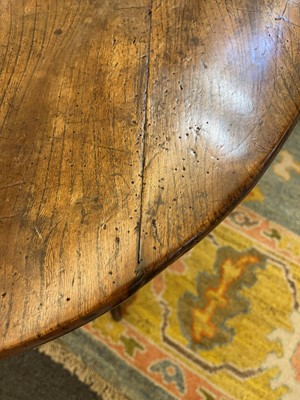 Lot 56 - A George III elm cricket table