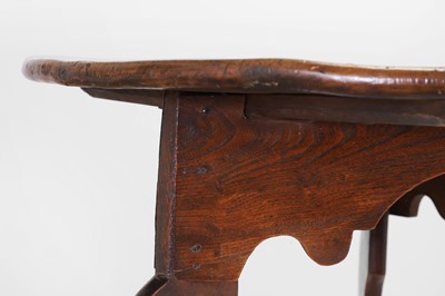 Lot 56 - A George III elm cricket table