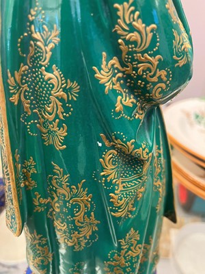 Lot 54 - A pair of porcelain figural scent holders