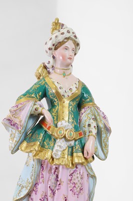 Lot 54 - A pair of porcelain figural scent holders