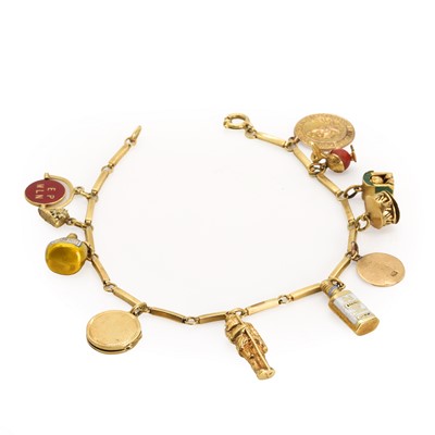 Lot 340 - A gold charm bracelet