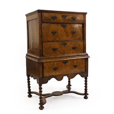 Lot 478 - A walnut cabinet on stand