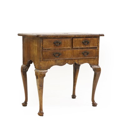 Lot 477 - A George II walnut lowboy