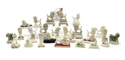 Lot 111 - A collection of Staffordshire pottery poodles