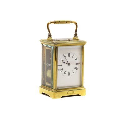 Lot 162 - A brass carriage clock