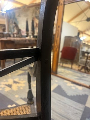 Lot 55 - A set of four Regency-style elbow chairs