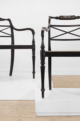 Lot 55 - A set of four Regency-style elbow chairs