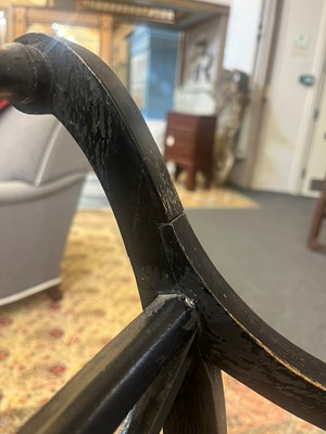 Lot 55 - A set of four Regency-style elbow chairs