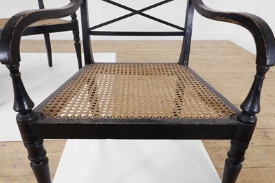 Lot 55 - A set of four Regency-style elbow chairs