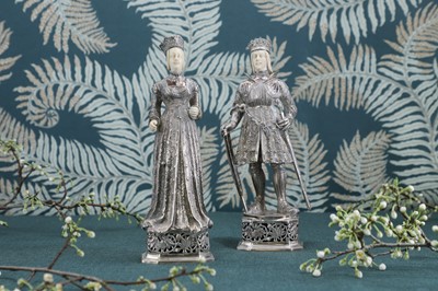 Lot 251 - A pair of silver and ivory-mounted figures