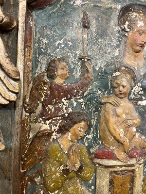 Lot 71 - A carved and painted altarpiece
