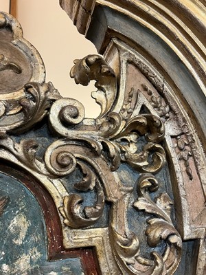 Lot 71 - A carved and painted altarpiece