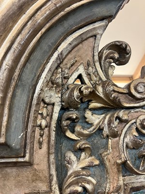 Lot 71 - A carved and painted altarpiece