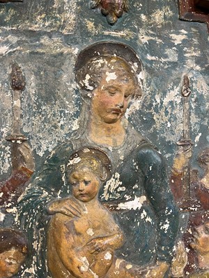 Lot 71 - A carved and painted altarpiece