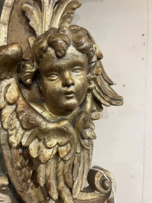 Lot 71 - A carved and painted altarpiece