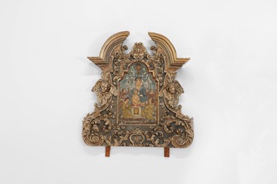 Lot 71 - A carved and painted altarpiece