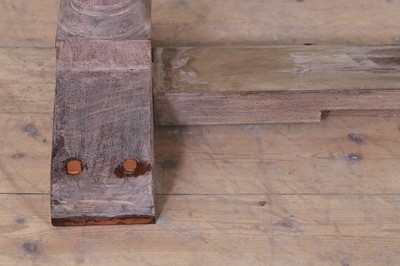 Lot 443 - A limed oak dining table